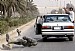 Legata ad un'auto e trascinata per le vie di Baghdad 3444