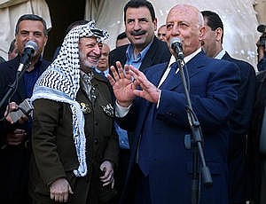 il leader palestineser Arafat e il suo primo ministro in una conferenza